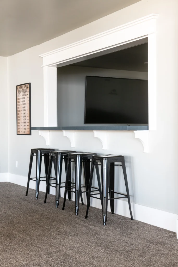 Warm, textural interior design work, Miller Time Ranch project featured in American Farmhouse Style magazine.