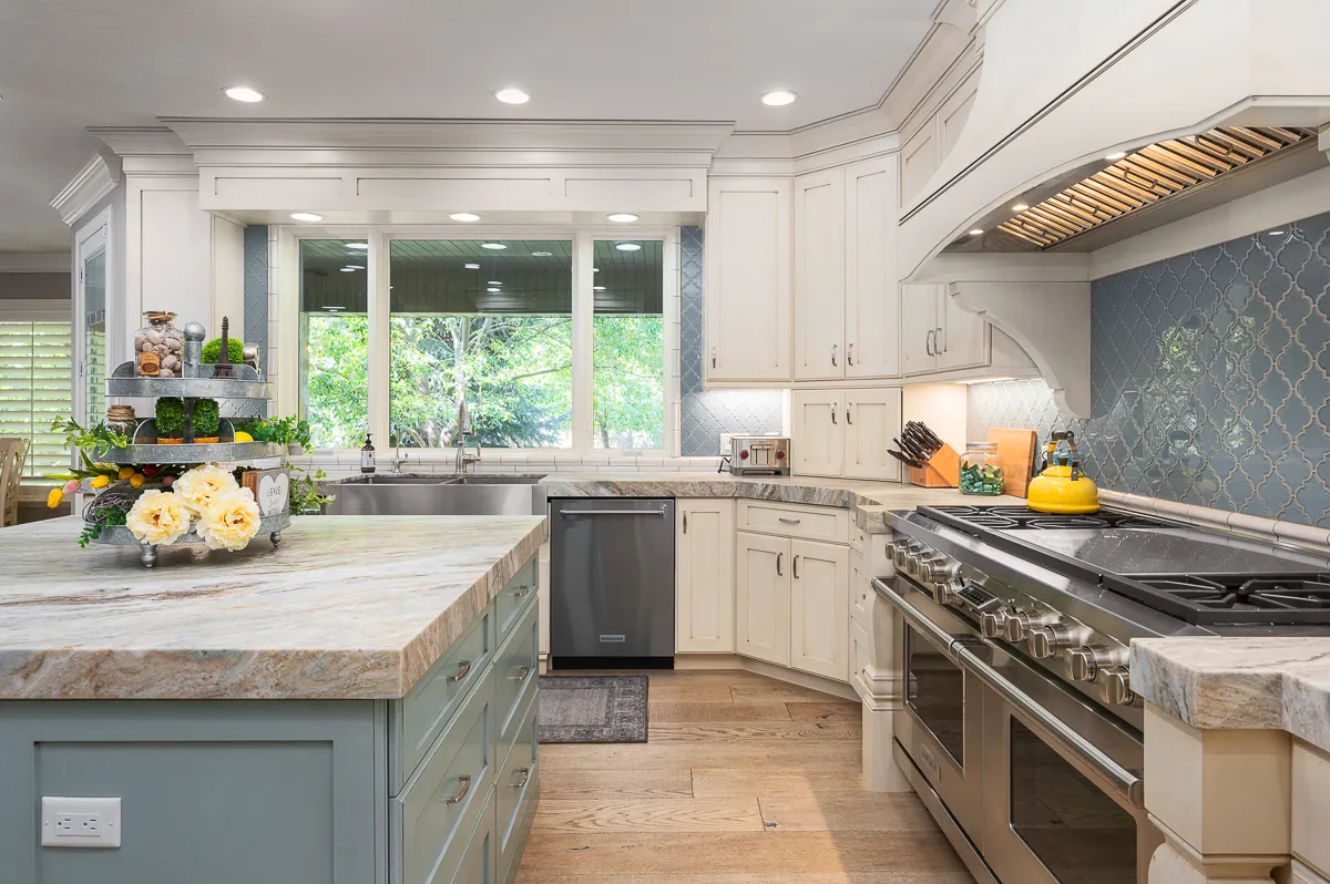 Renovated kitchen in the Updated Old World project by Lisa Marie Design Co.